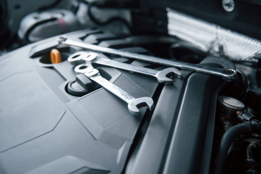 Repair Tools Lying Down Engine Automobile Hood